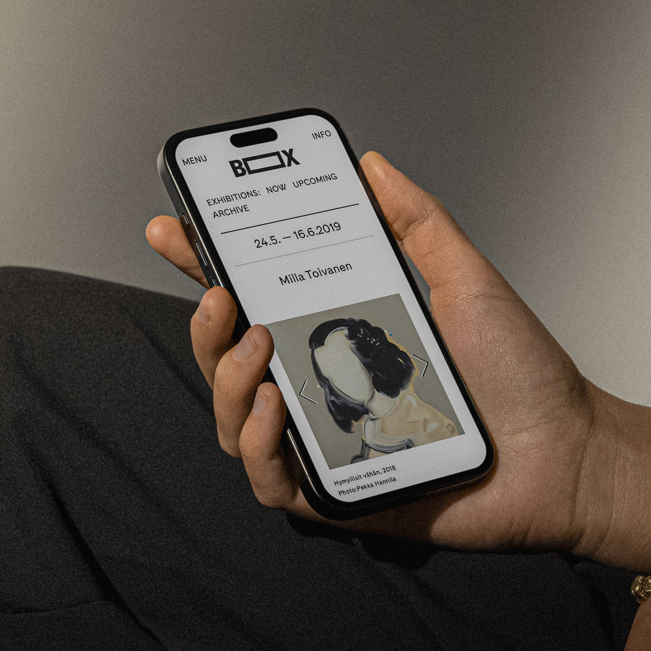 Forum Box's website on an mobile phone in someones hand.